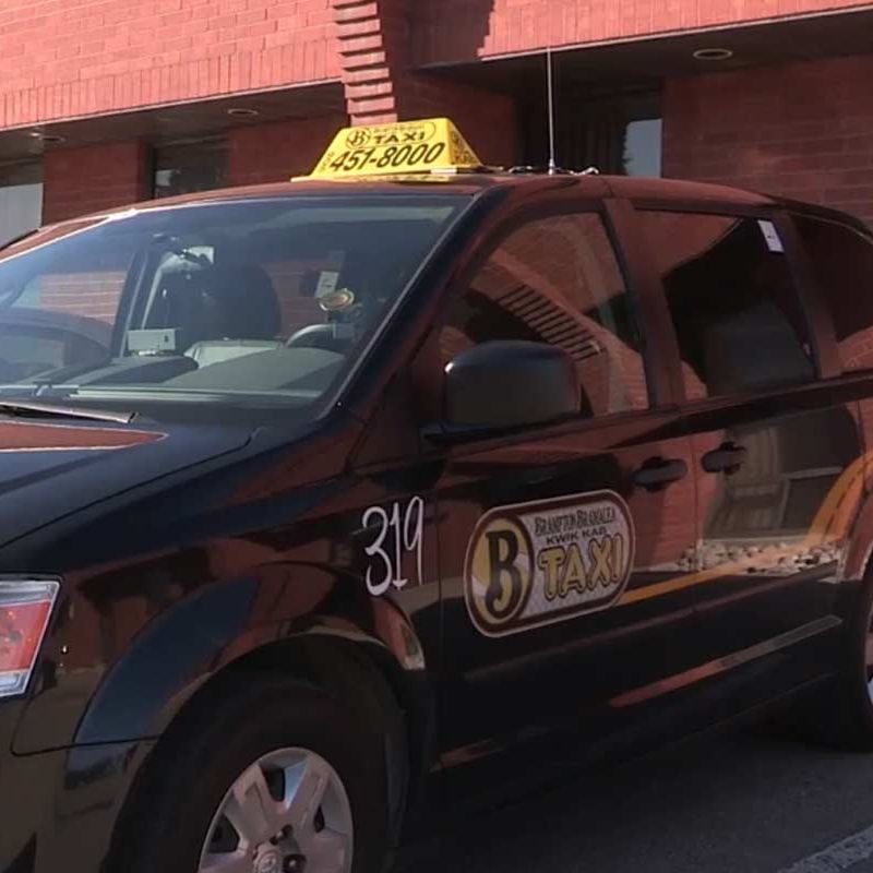 Brampton Bramalea Kwik Kab taxi in the parking lot